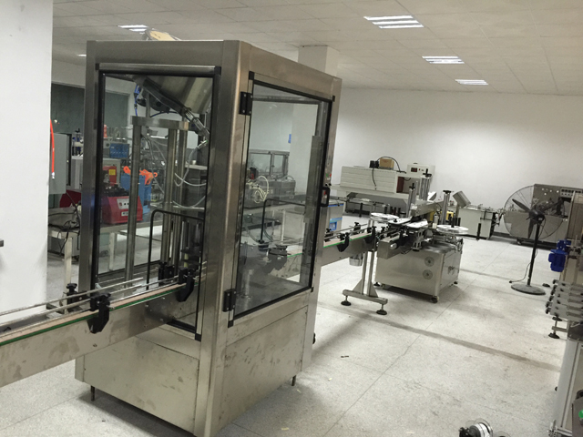 γραμμή καπακιού μηχανής ετικετών.jpg