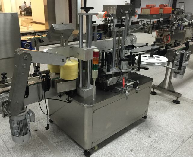 κλείστε φωτογραφίες για labeling machinery.jpg