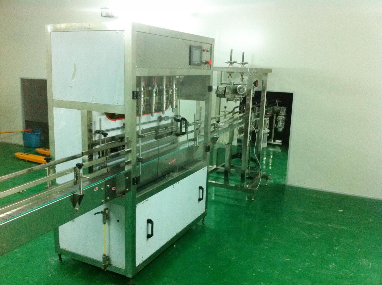Linear filling machine with 4 filling heads ΓΡΑΜΜΙΚΗ ΜΗΧΑΝΗ ΓΕΜΙΣΗΣ.jpg