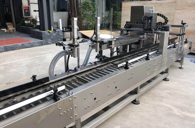 μηχάνημα πλήρωσης κάδου λαδιού.jpg