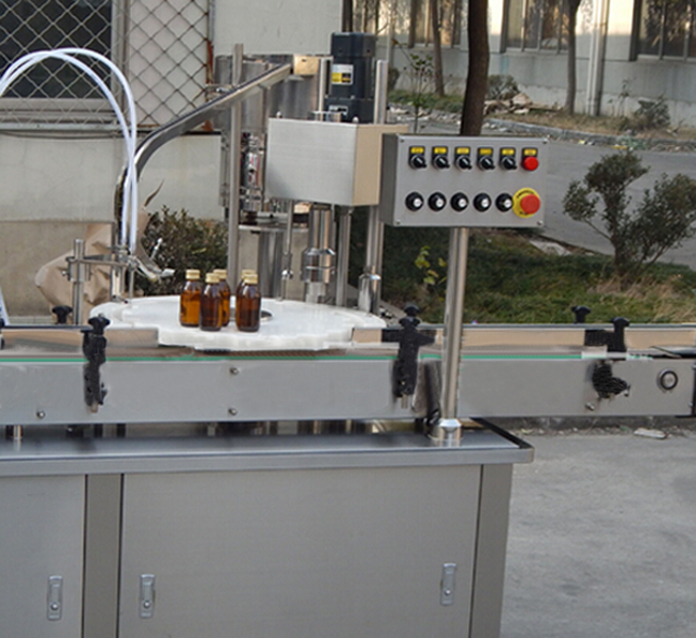 vials capping machine μηχανή κάλυψης για γυάλινα βάζα.jpg