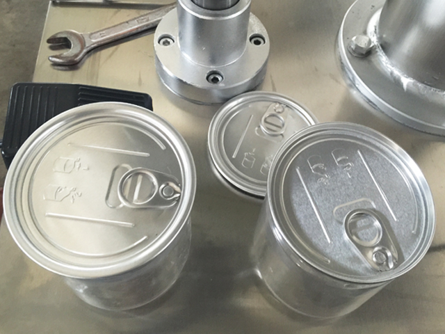 Μηχανή κάλυψης μεταλλικών κουτιών.jpg