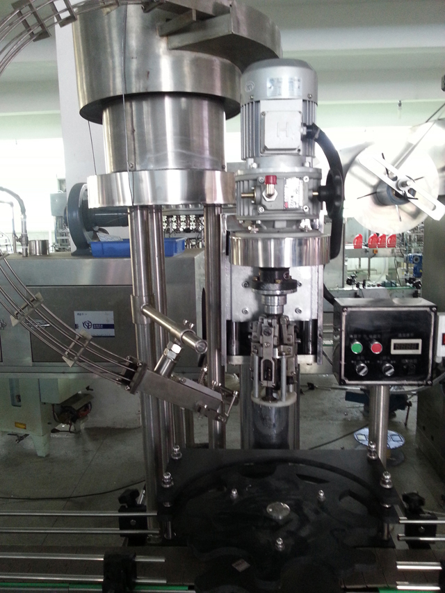 μηχανή κάλυψης για μπουκάλια.jpg