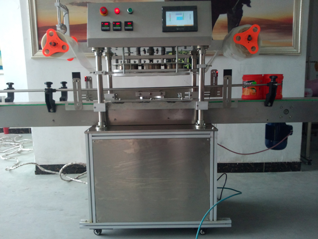 automatic three heads jars sealing equipment μηχανή σφράγισης βάζων.jpg