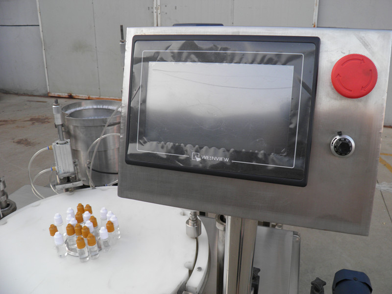 filling plugging capping labeling production line Ετικέτα υγρού PLC πλήρωσης φιάλης labeling.jpg