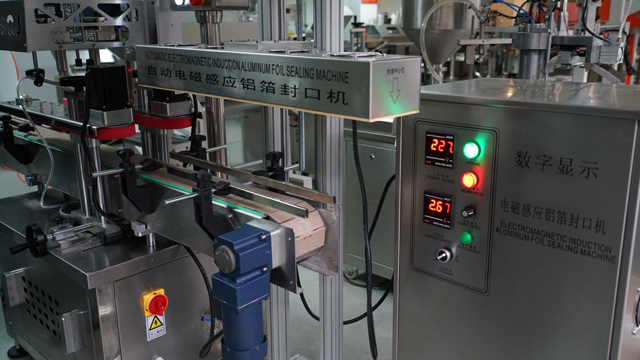 aluminum induction foil sealing machine στεγανοποιητική μηχανή αυτόματη.jpg