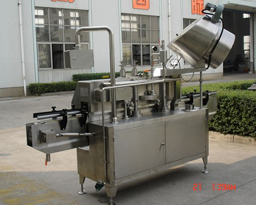 PLC-controlled system glass Jar twist off Steam Capper equipment vacuum capping machine for Glass Jars πίσω πλάνο καπακιού κενού περιστροφής.jpg