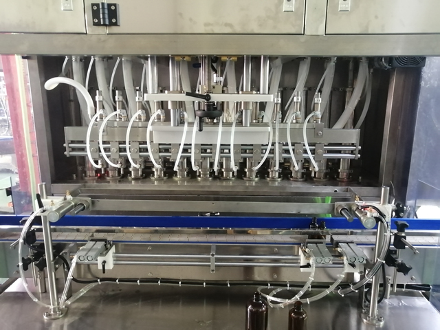 Μηχανή πλήρωσης 12 κεφαλών με θερμαντήρα ανάμειξης (4).jpg