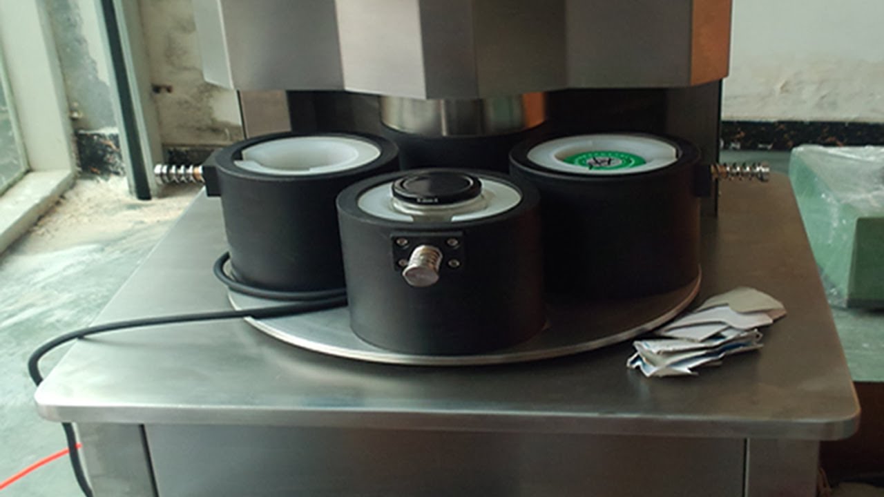 four heads vacuum capping machine semi automatic εγχειρίδιο καπακιού κενού.jpg