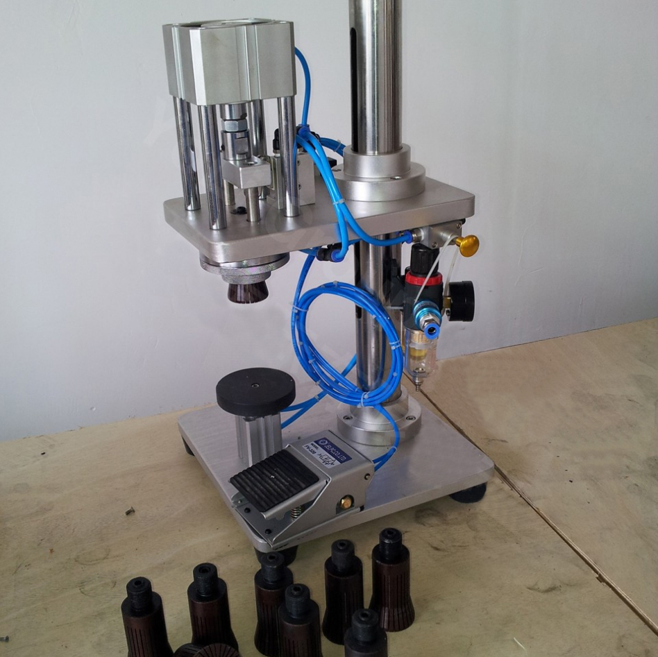 manual crimping machine for glass bottles εξοπλισμός πνευματικής κάλυψης ημιαυτόματο pneumatic.jpg