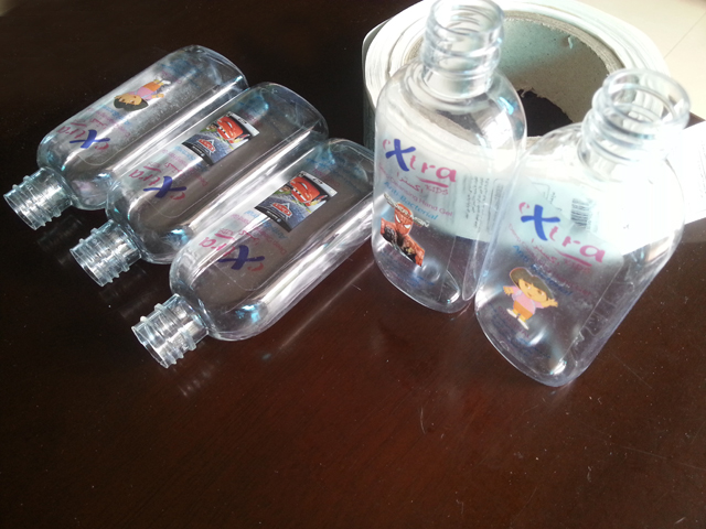 transparent labels labelled samples bottles plane surface Ο Mrwan δείγμα διαφανών ετικετών και φιαλών (3).jpg